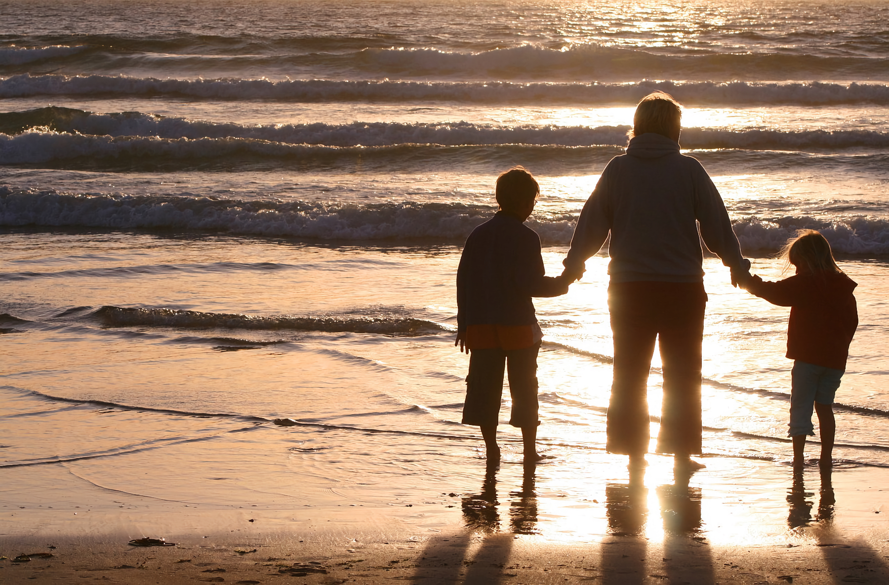 mother and children by ocean 2